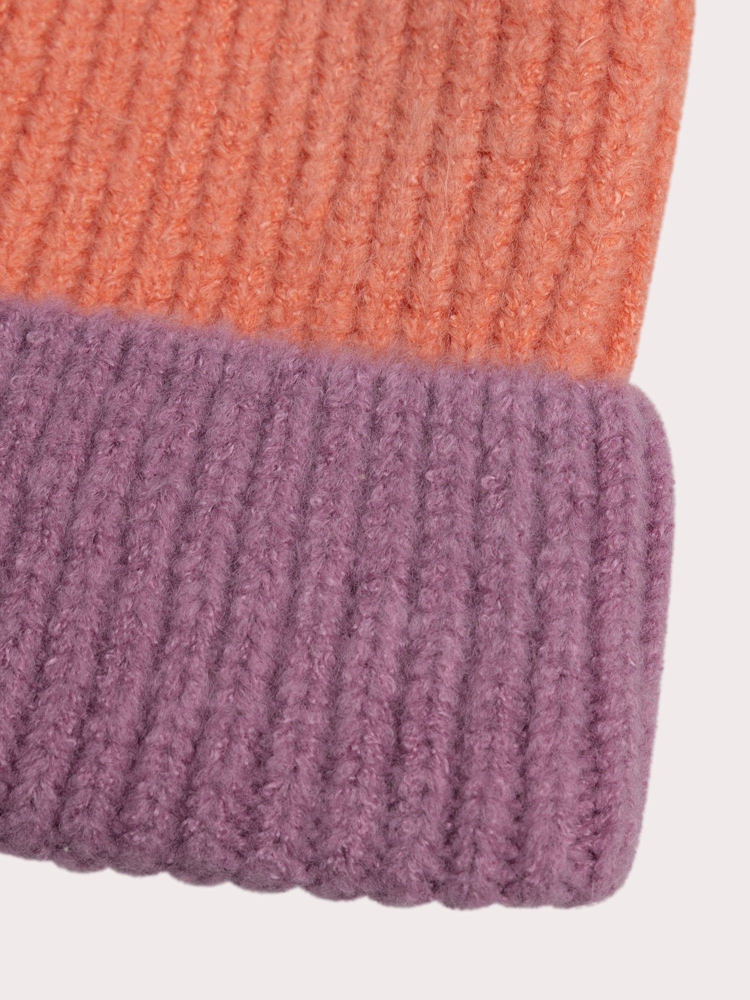 Cappello bicolore con pompon per ragazze