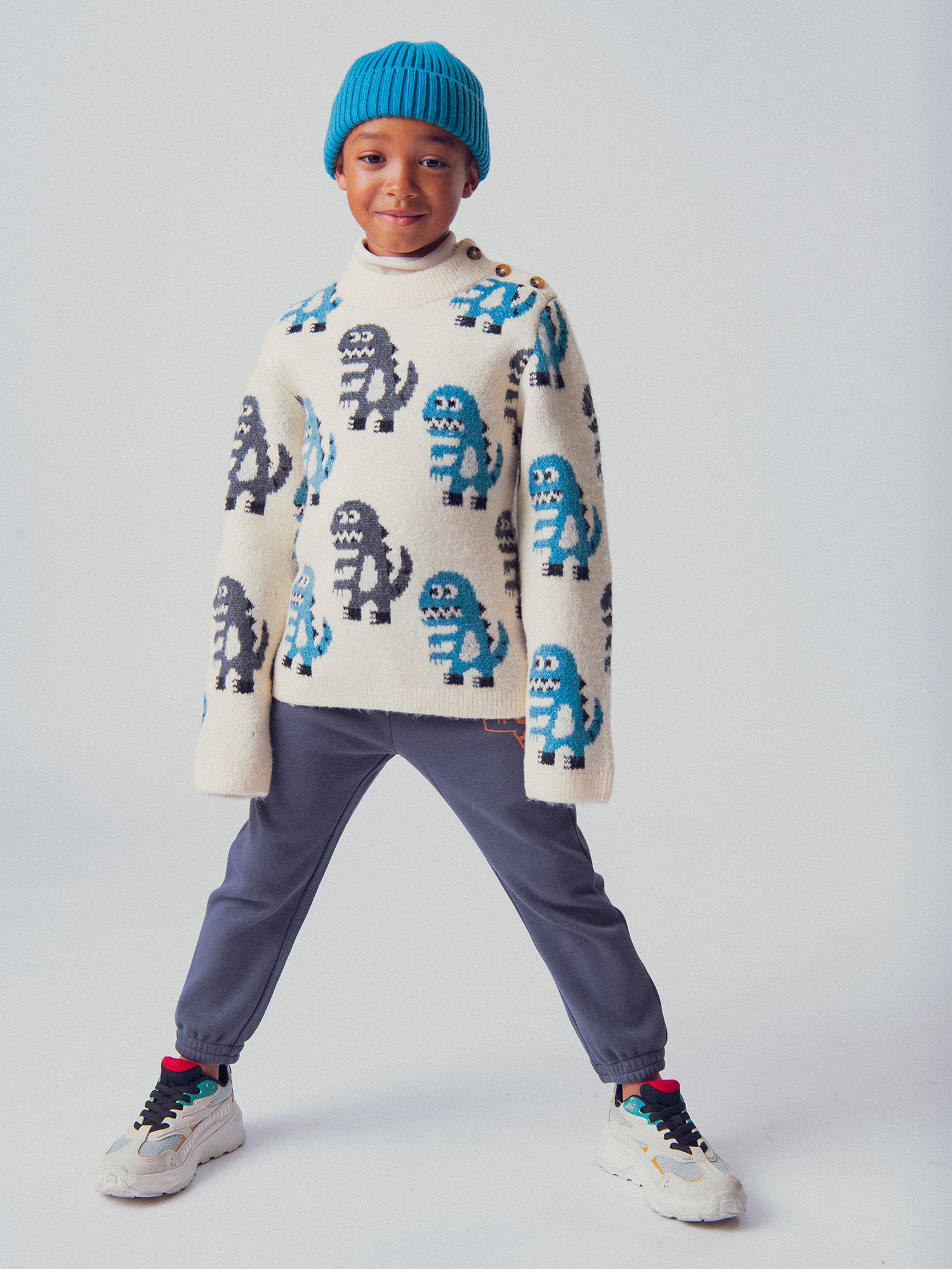 Pull tricoté en jacquard à motif dinosaure