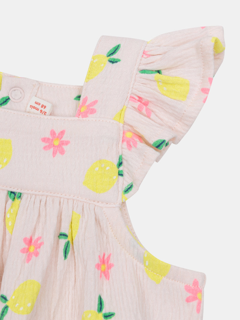 Salopette rosa con stampa di limoni e fiori per bambina