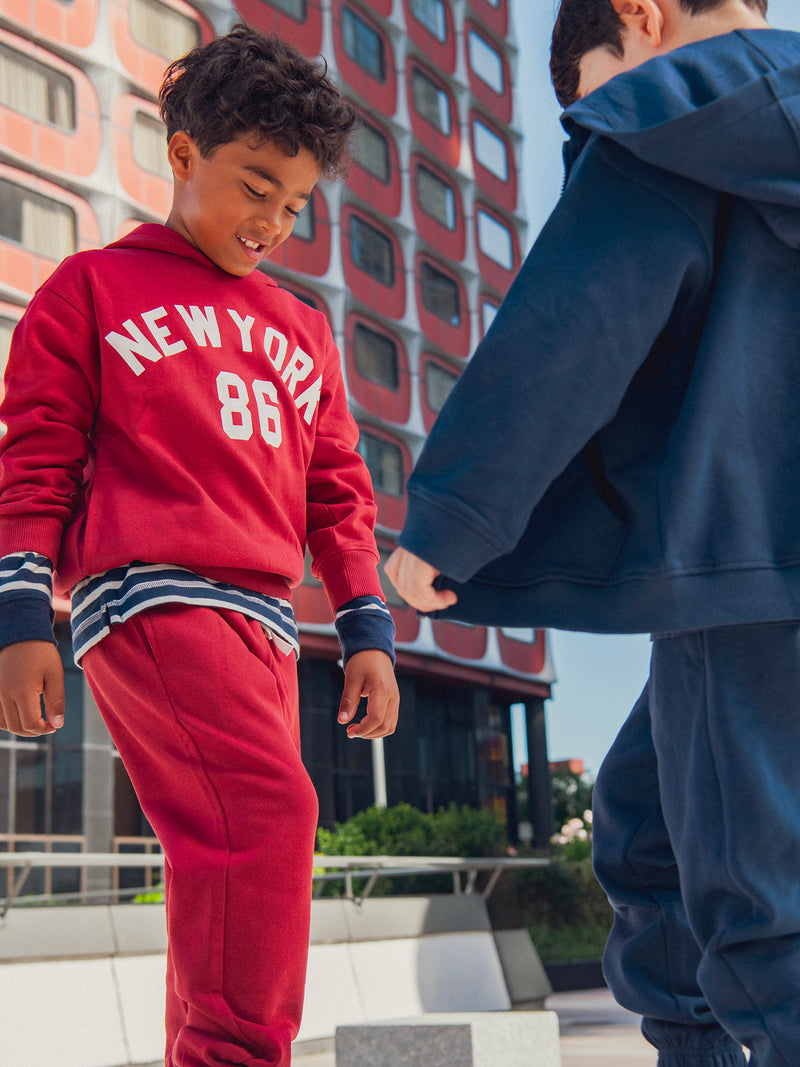 Haute de jogging rouge à capuche pour garçon