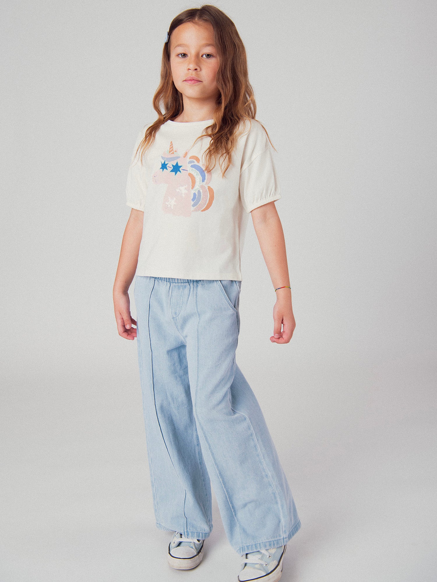 Pantaloni in denim blu chiaro con tasche per ragazze