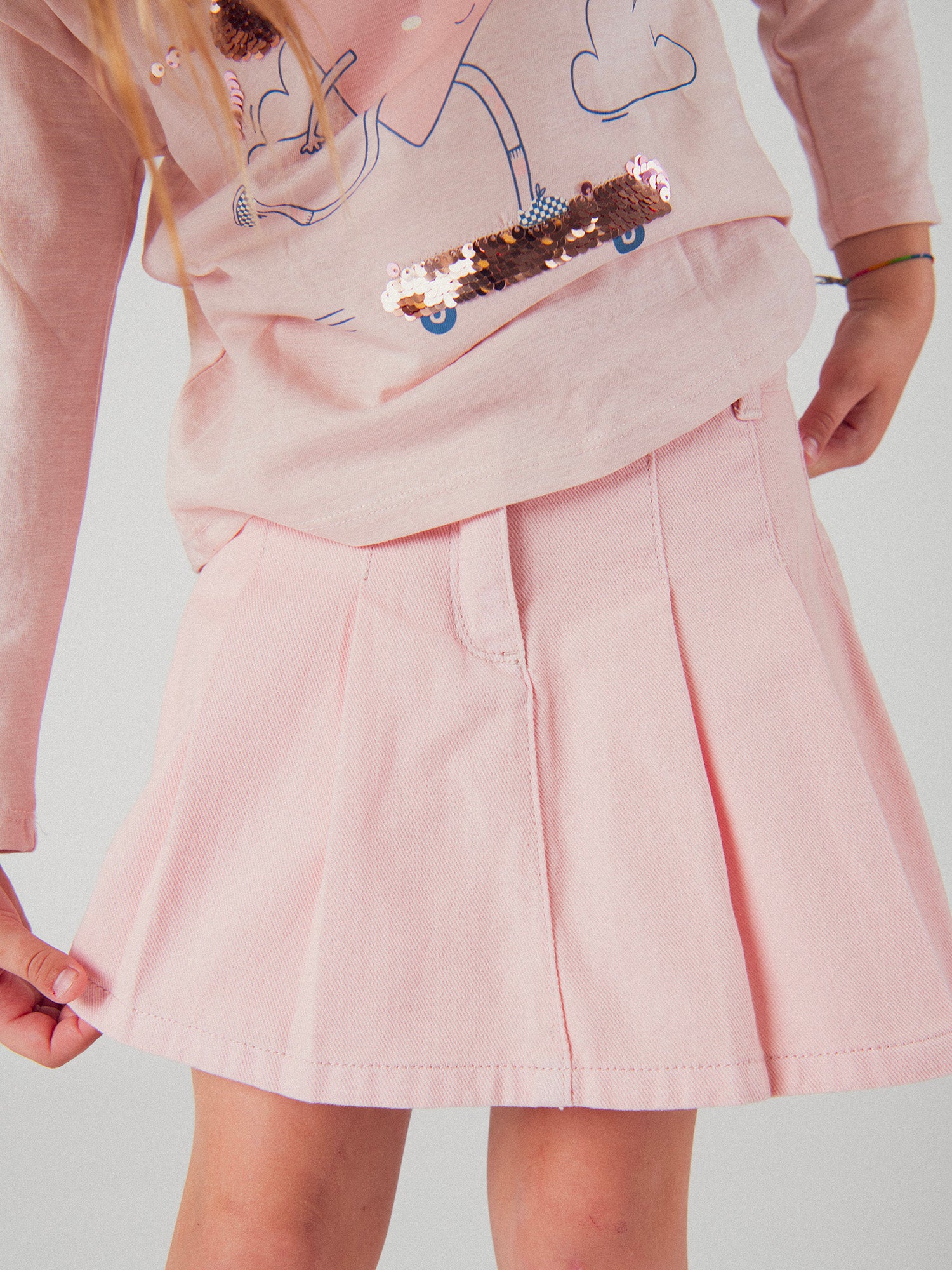 Gonna corta rosa con tasche per ragazze