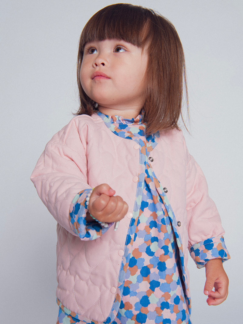 Cardigan reversibile imbottito rosa con cuori per bambina