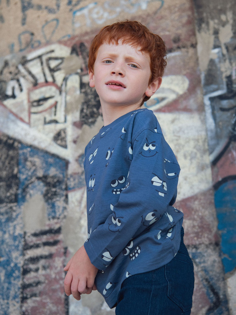 T-shirt blu a maniche lunghe con stampa di occhi fosforescenti per ragazzi