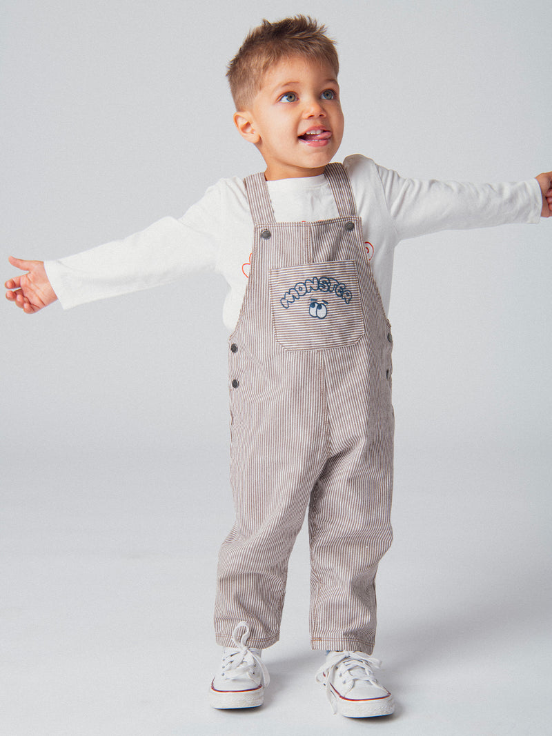 Salopette a righe in denim cacao e ecru "Monster" per bambino
