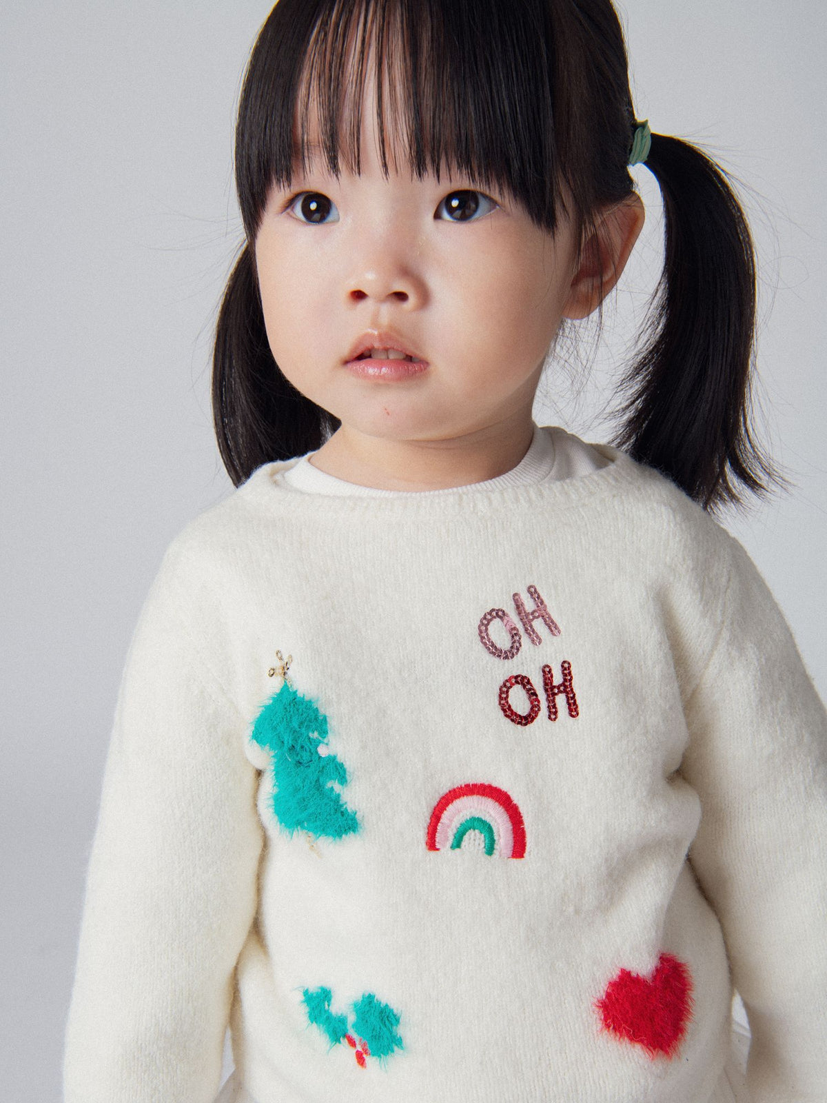 Pull écru à motifs festifs et touches étincelantes pour bébé fille