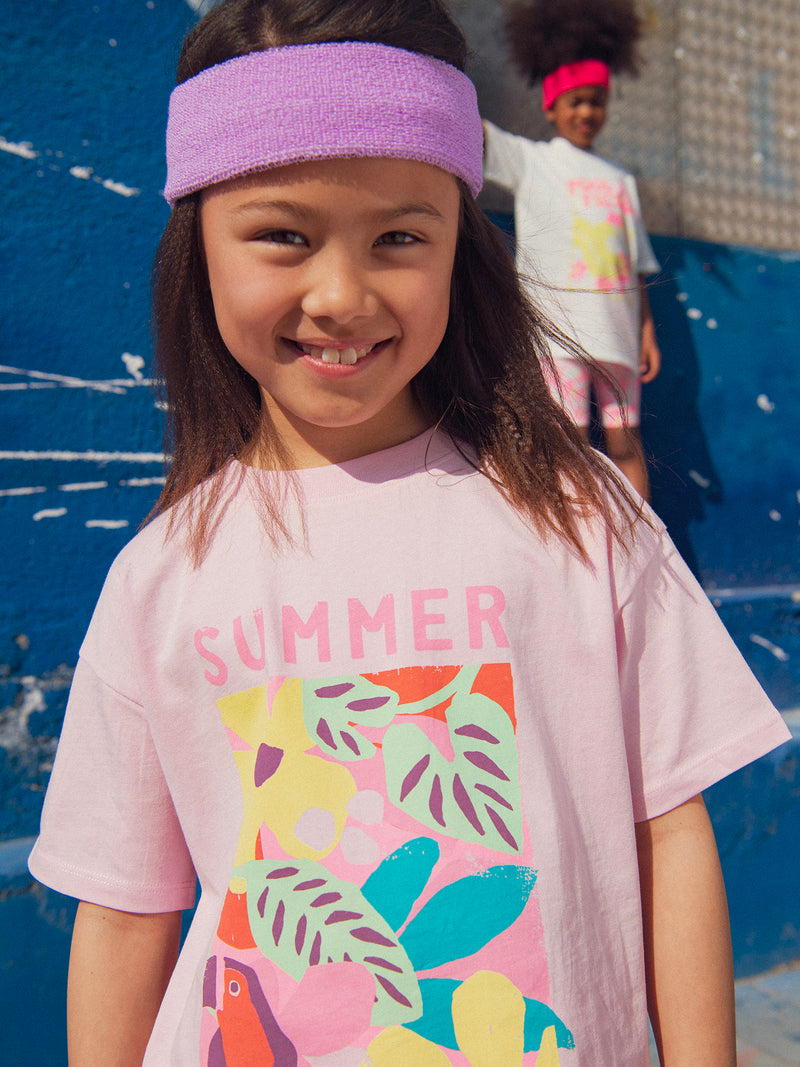 T-shirt oversize rosa con animazione floreale per ragazze