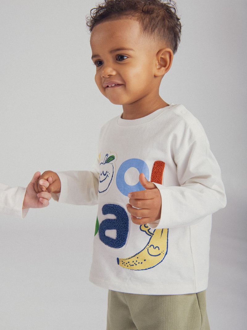 T-shirt ecru con motivo di frutta per bambino