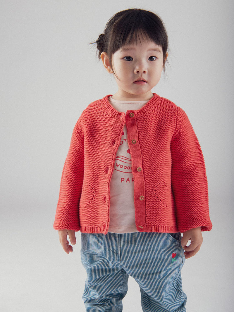 Cardigan tricot anguria con tasche a cuore per bambina