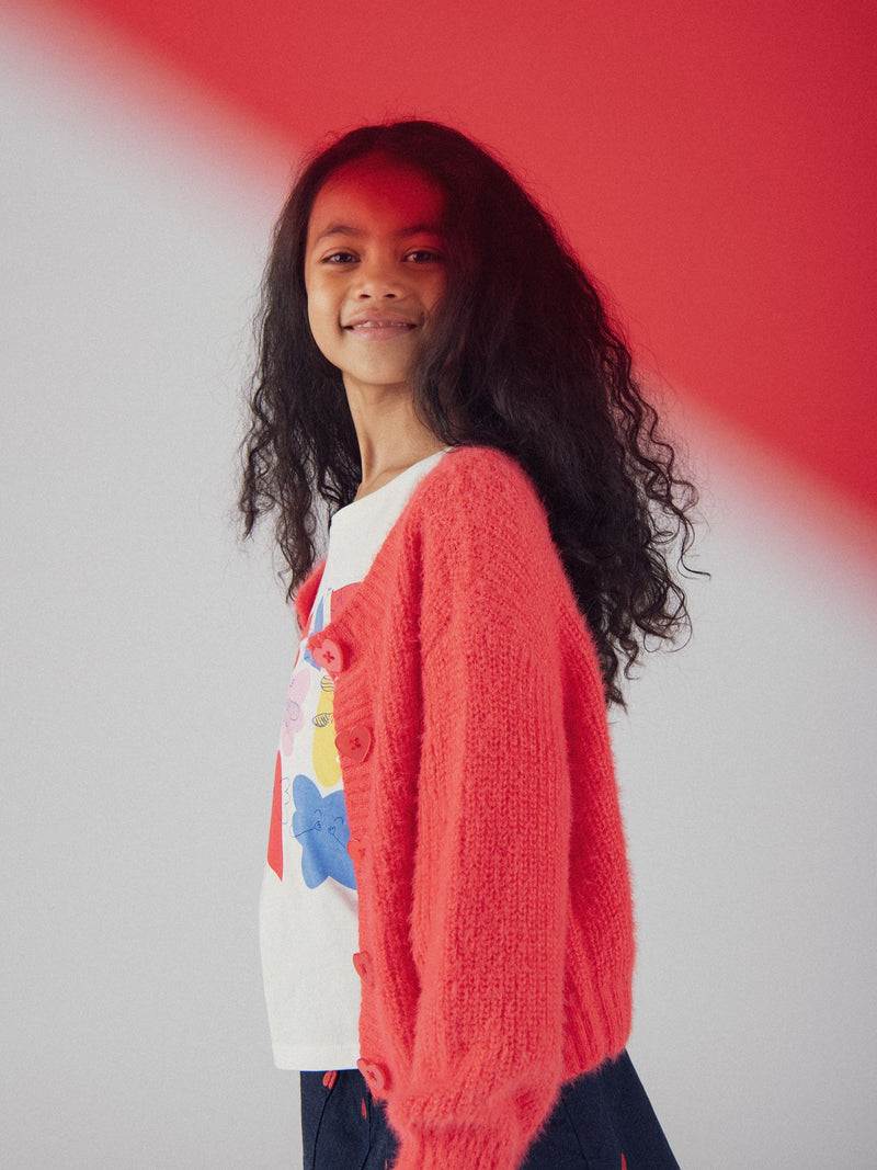 Cardigan rosso con bottoni a cuore per bambina