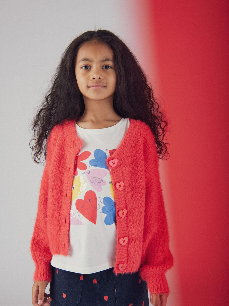Cardigan rosso con bottoni a cuore per bambina