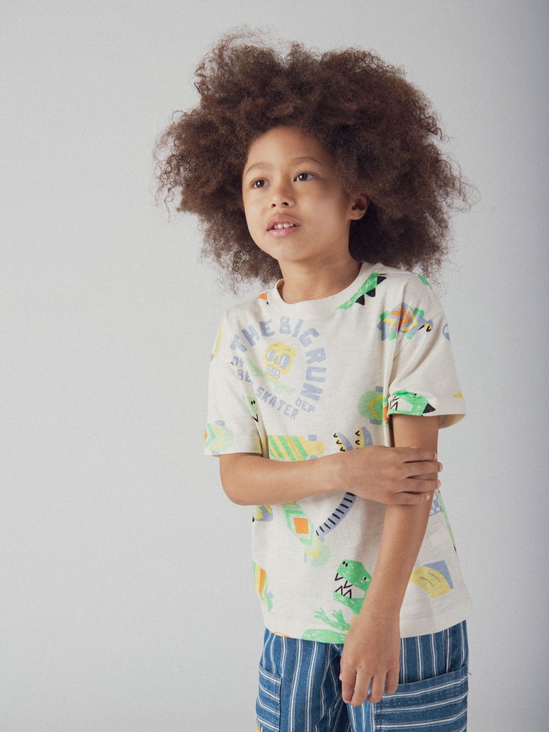T-shirt ecru con stampa di dinosauro per ragazzi