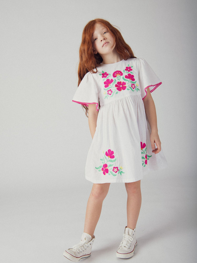Vestito bianco con ricami floreali per ragazze