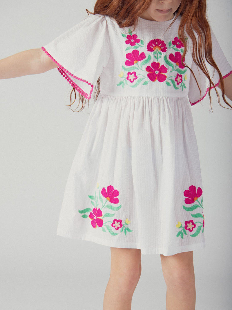 Vestito bianco con ricami floreali per ragazze