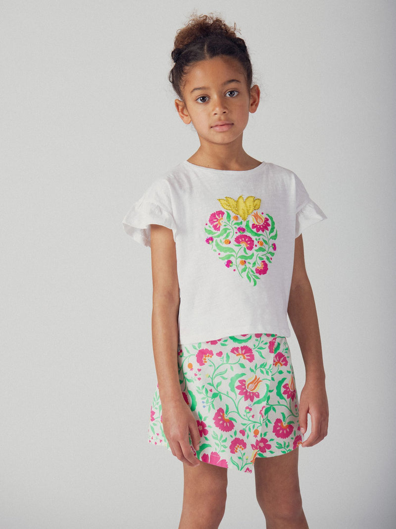 T-shirt bianca con animazione a cuore per ragazze