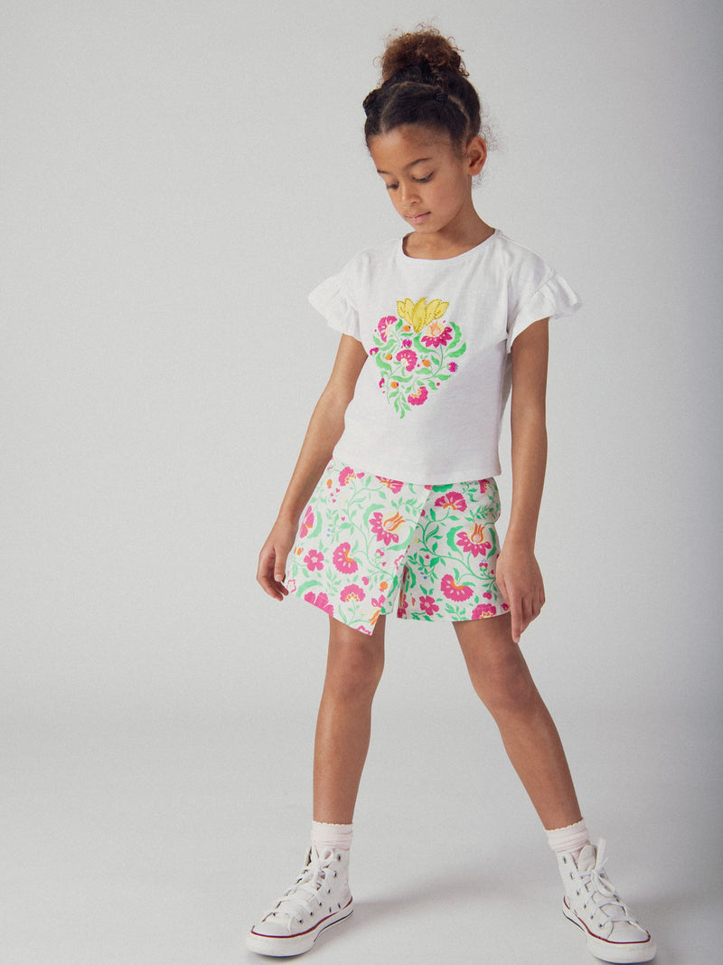 T-shirt bianca con animazione a cuore per ragazze