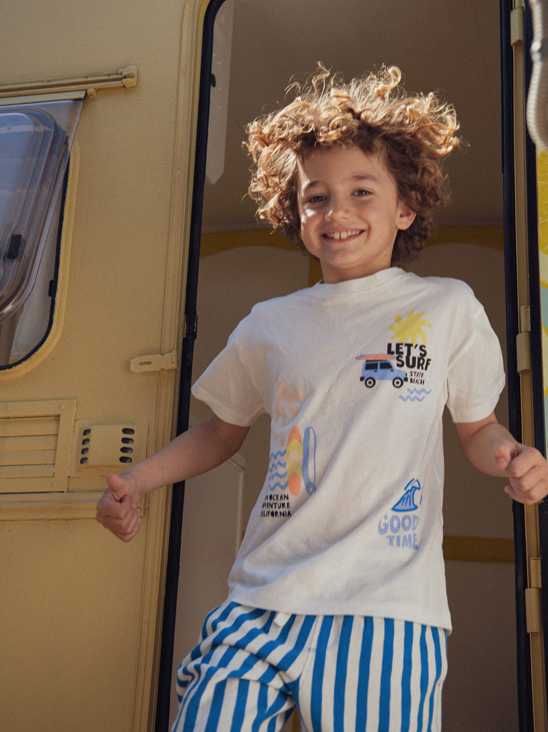 T-shirt ecru con animazioni da spiaggia per ragazzi