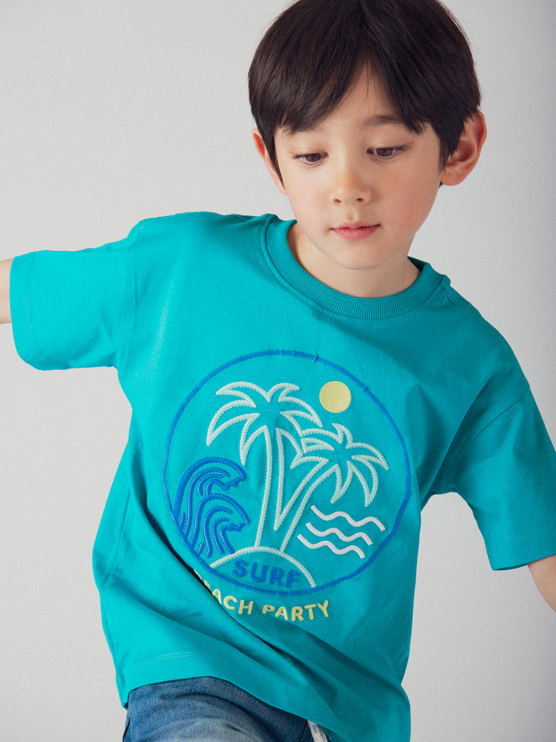 T-shirt blu turchese con animazione in spiaggia per bambino