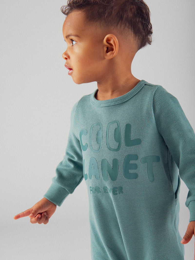 Pigiama verde "Good Vibes" in maglia goffrata per bambino