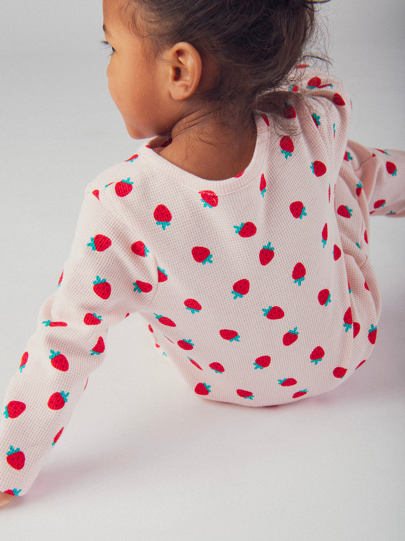 Pigiama rosa con stampa integrale di fragole per bambina