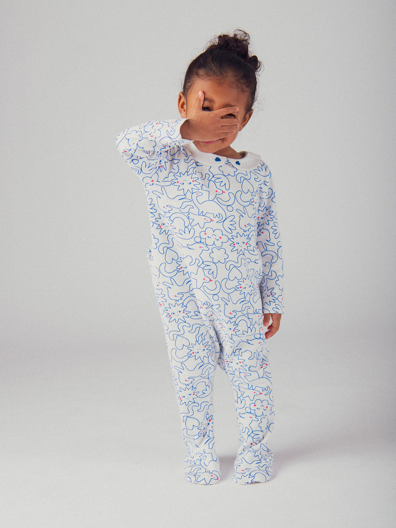 Pagliaccetto ecru con colletto Claudine e stampa blu "Dream" per bambina