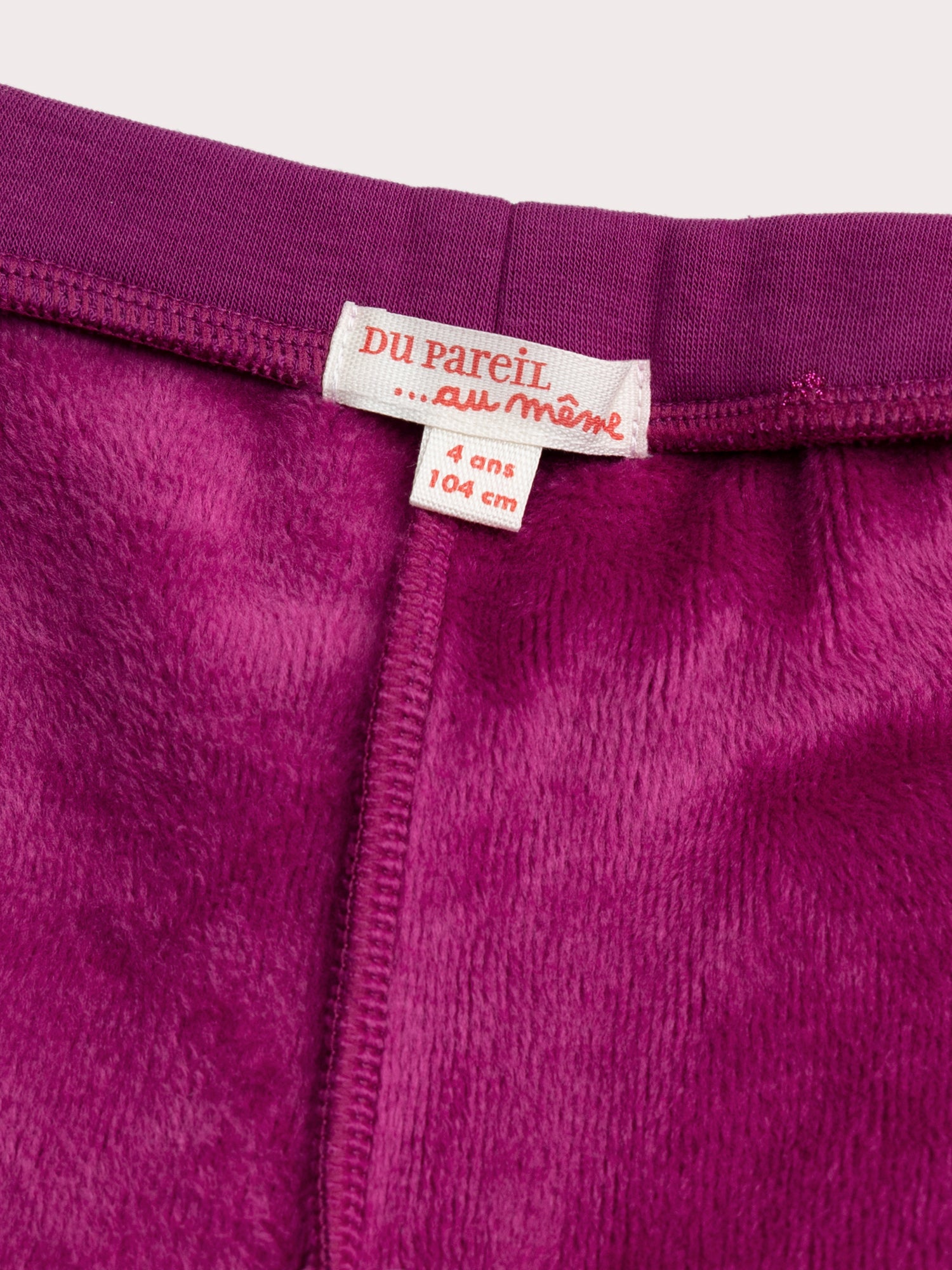Legging rosa con stampa a cuore e glitter