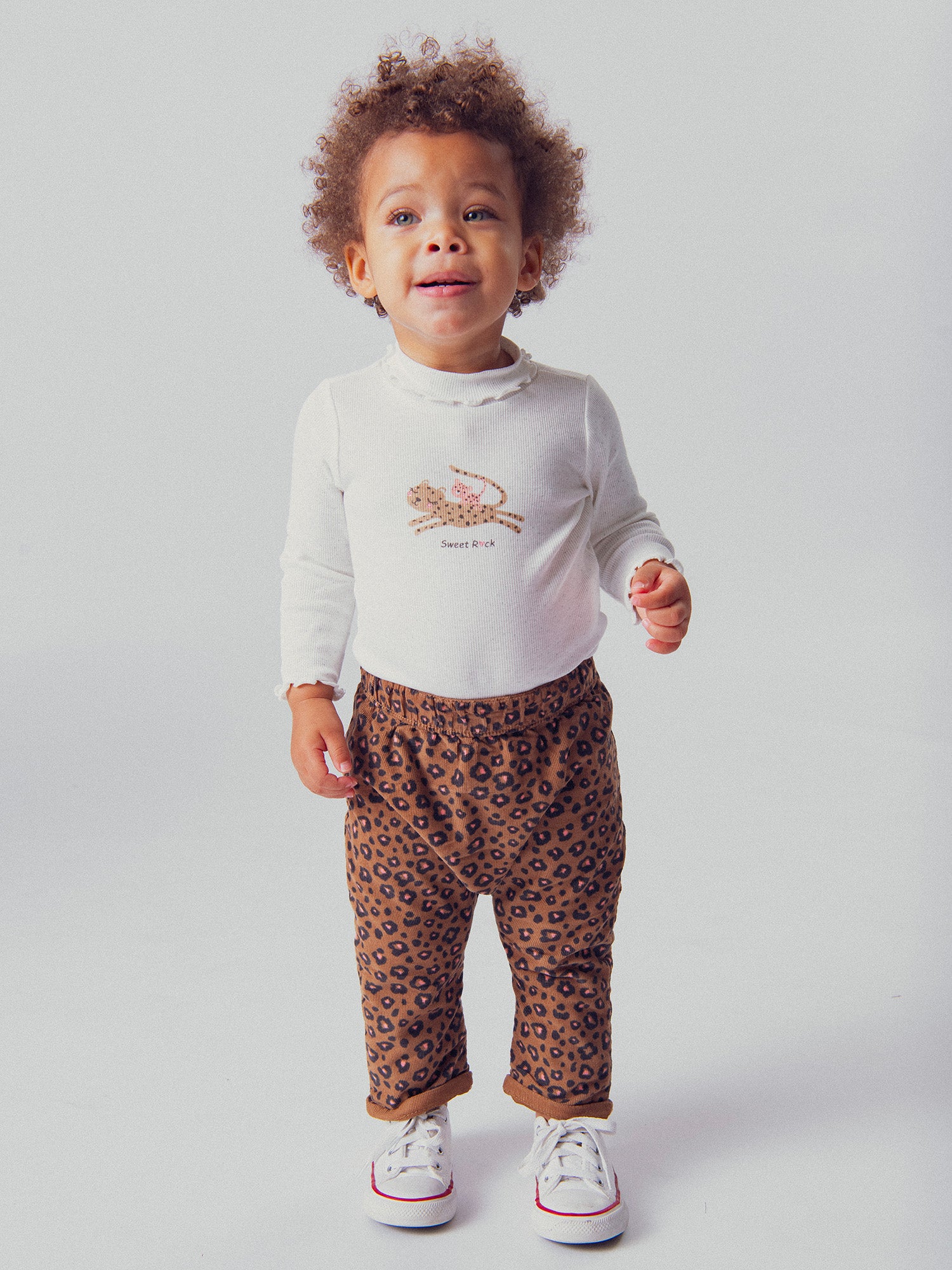 Pantaloni leopardati reversibili per bambina