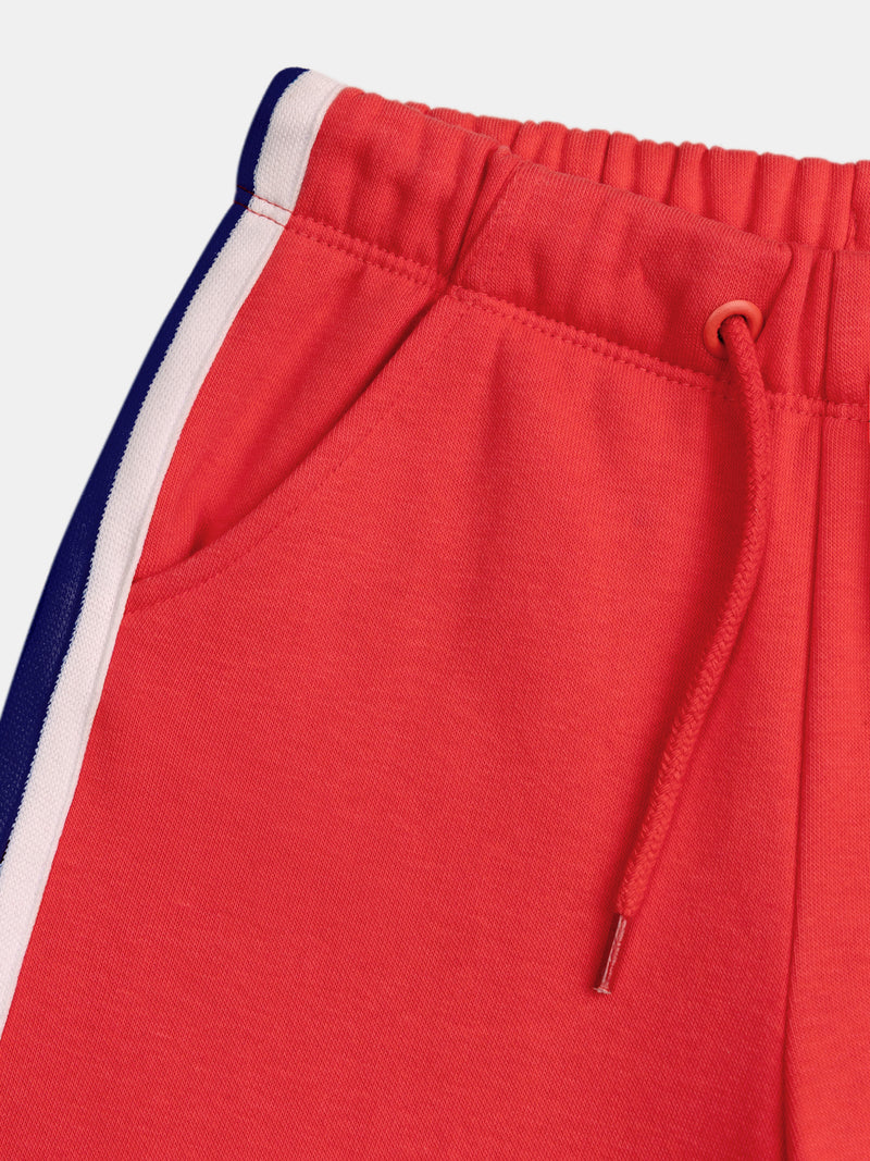 Pantaloni rossi in felpa con strisce colorate per ragazze