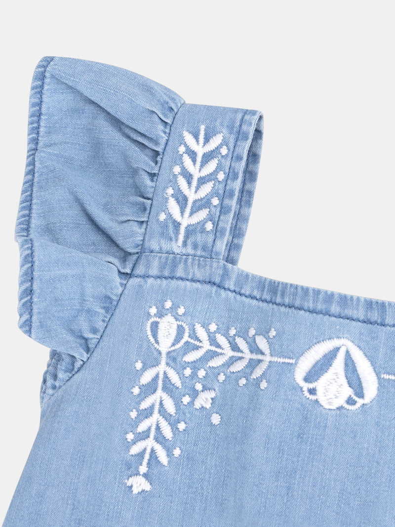 Camicia blu con ricami floreali per bambina