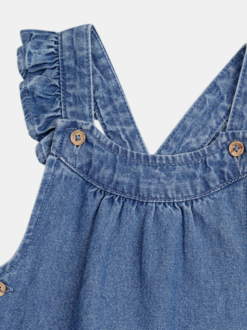 Salopette in denim con tasche a forma di cuore ricamate per bambina