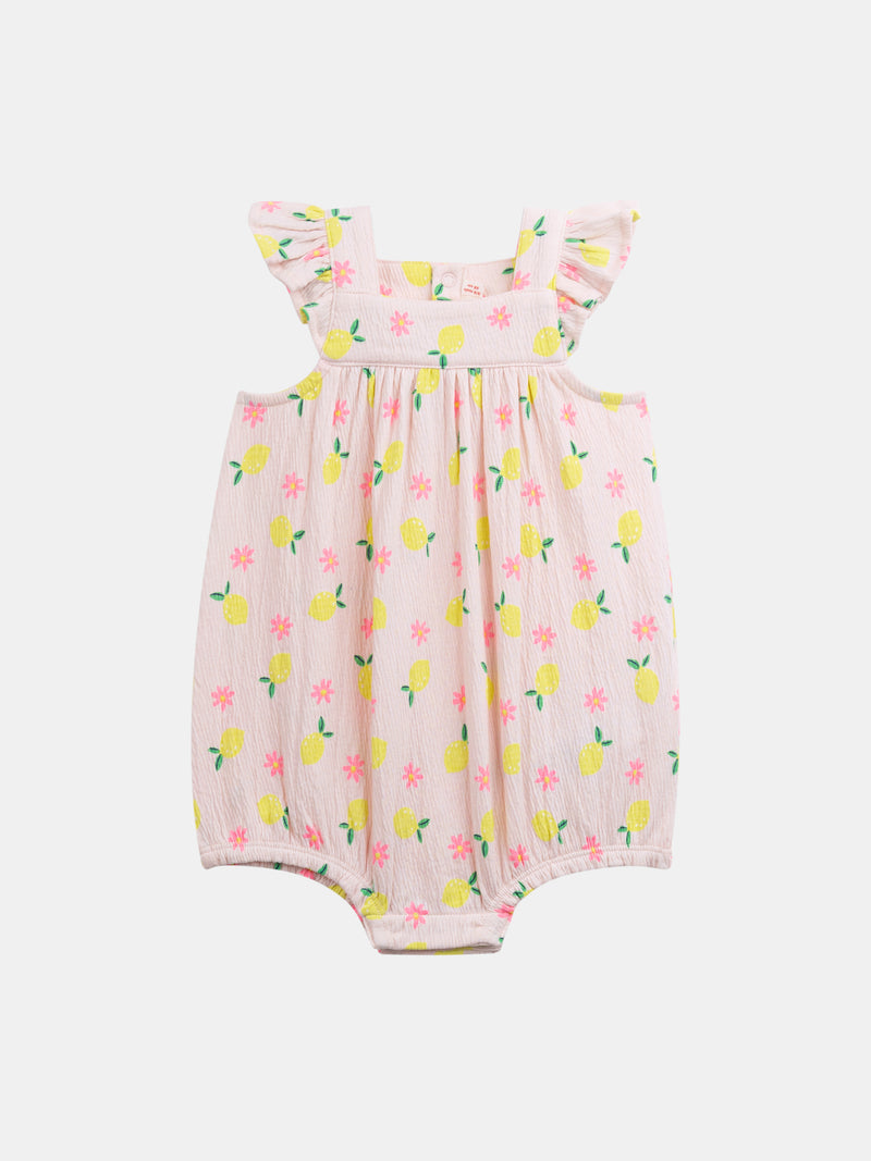 Salopette rosa con stampa di limoni e fiori per bambina