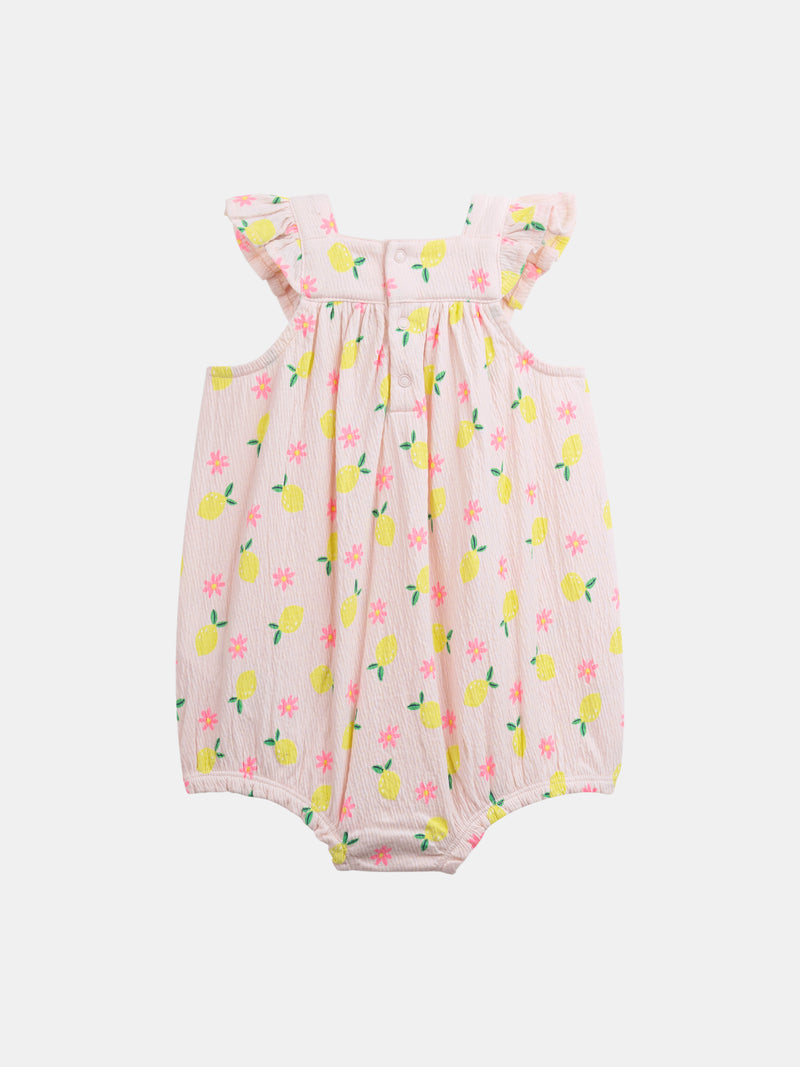 Salopette rosa con stampa di limoni e fiori per bambina