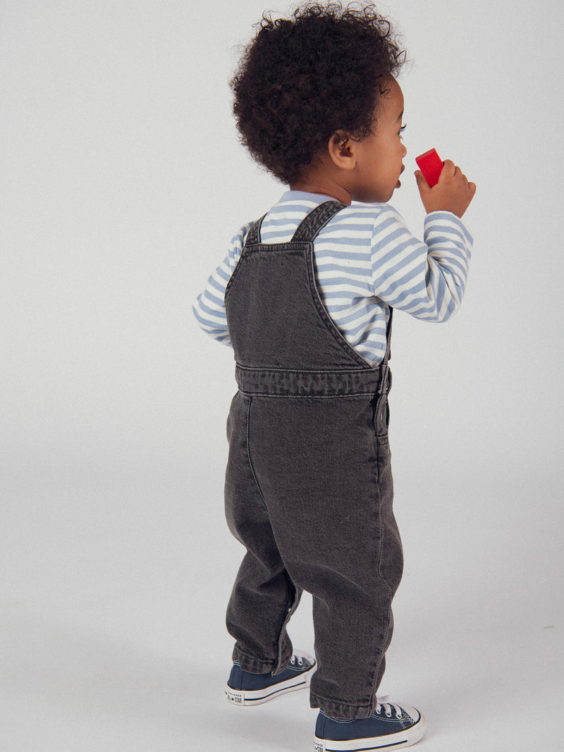 Salopette in denim grigia "Dinosauro" per bambino