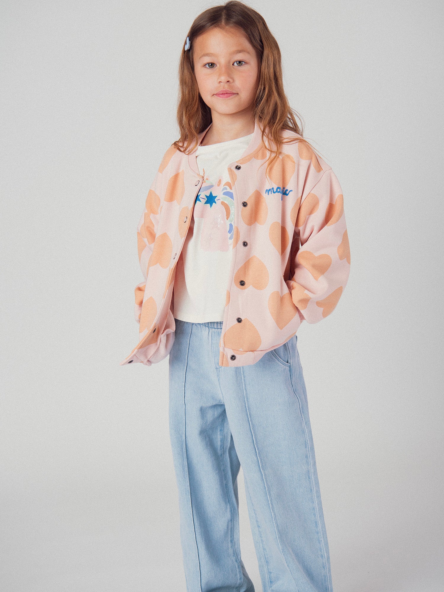 Cardigan rosa con stampa a cuore per bambine