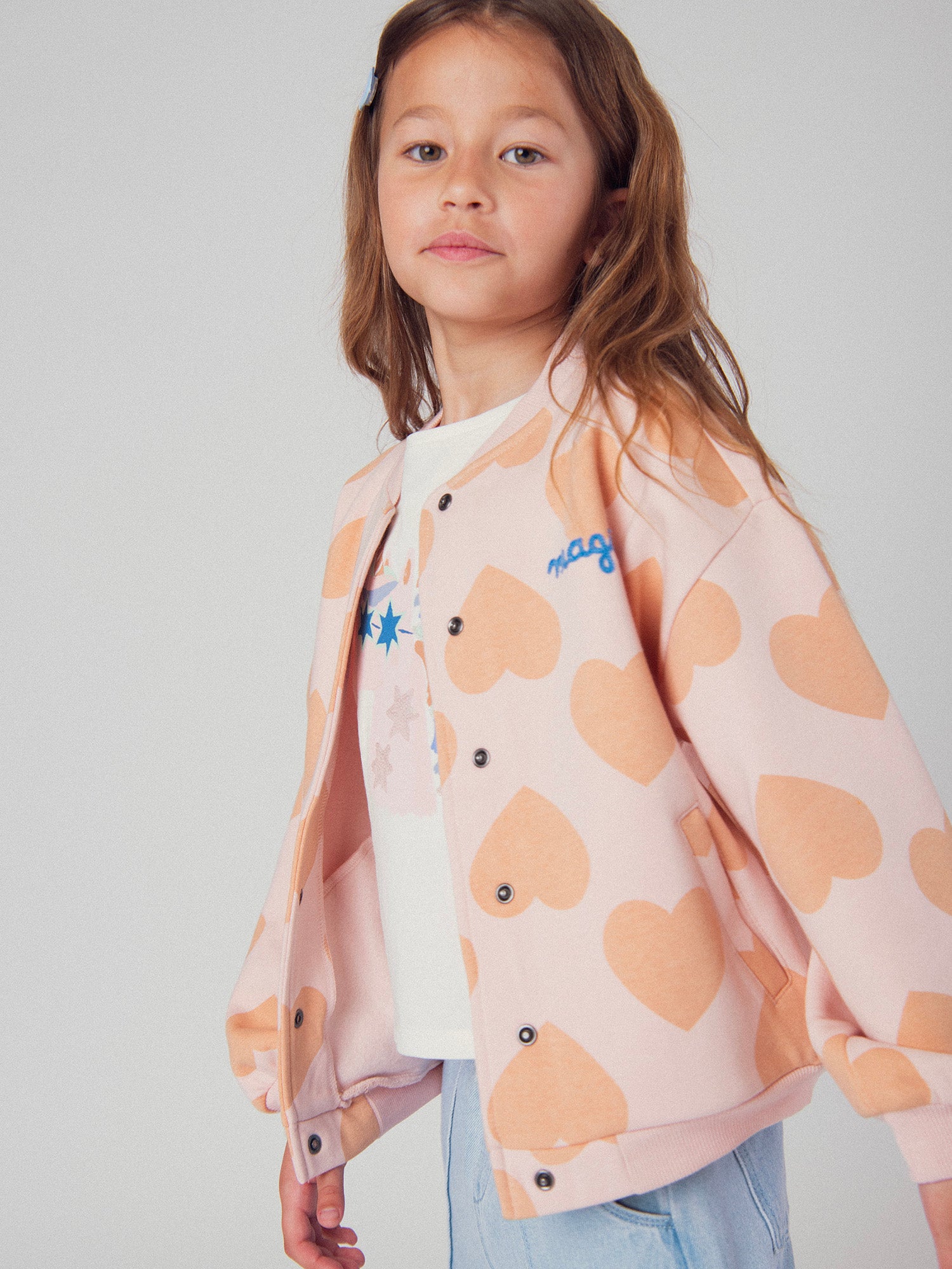 Cardigan rosa con stampa a cuore per bambine