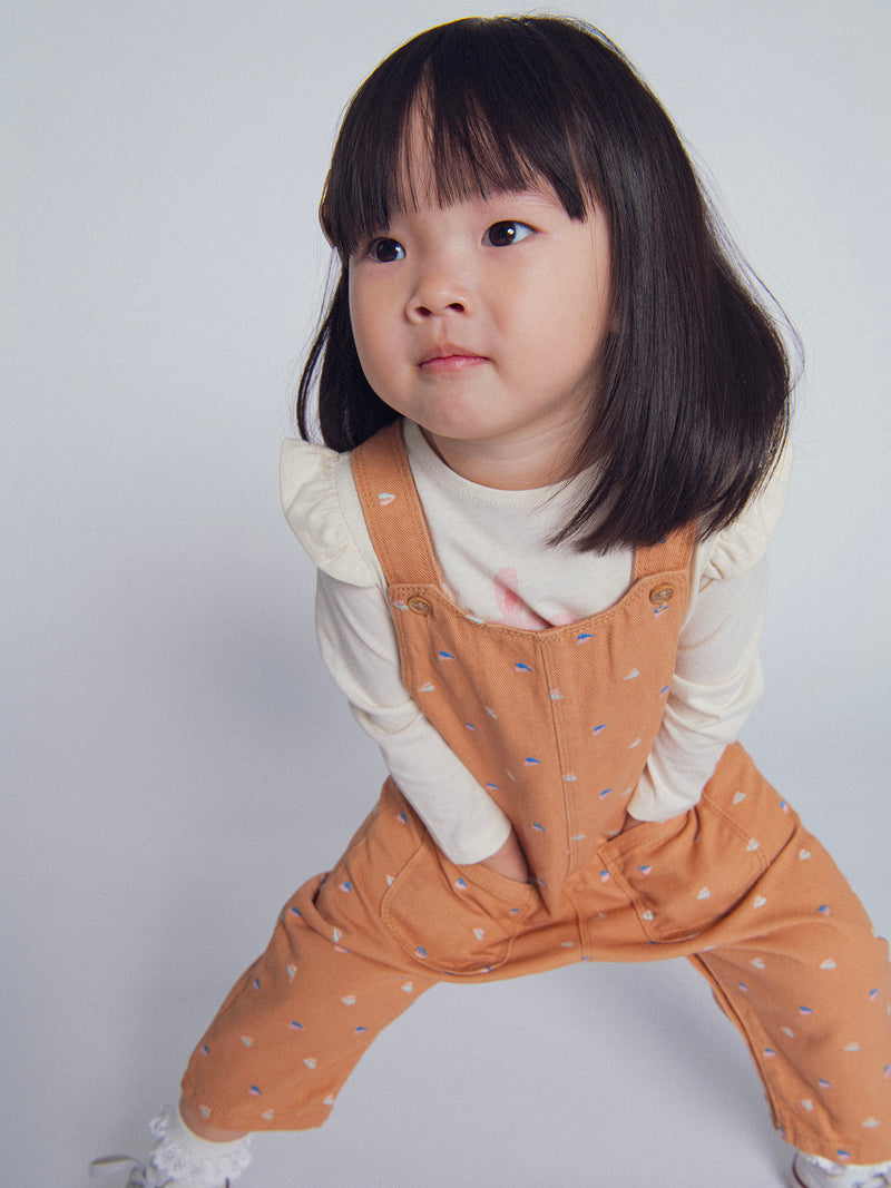 T-shirt ecru a maniche lunghe con volant "Coniglio sul Monopattino" per Bambina