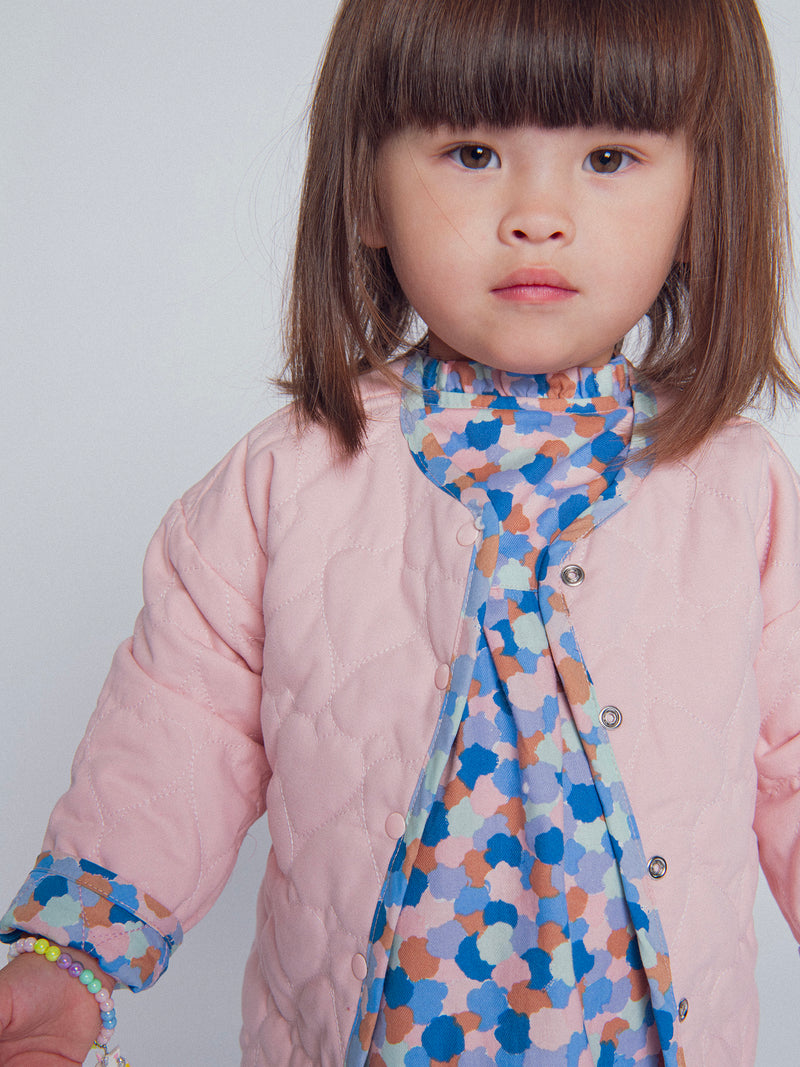 Cardigan reversibile imbottito rosa con cuori per bambina