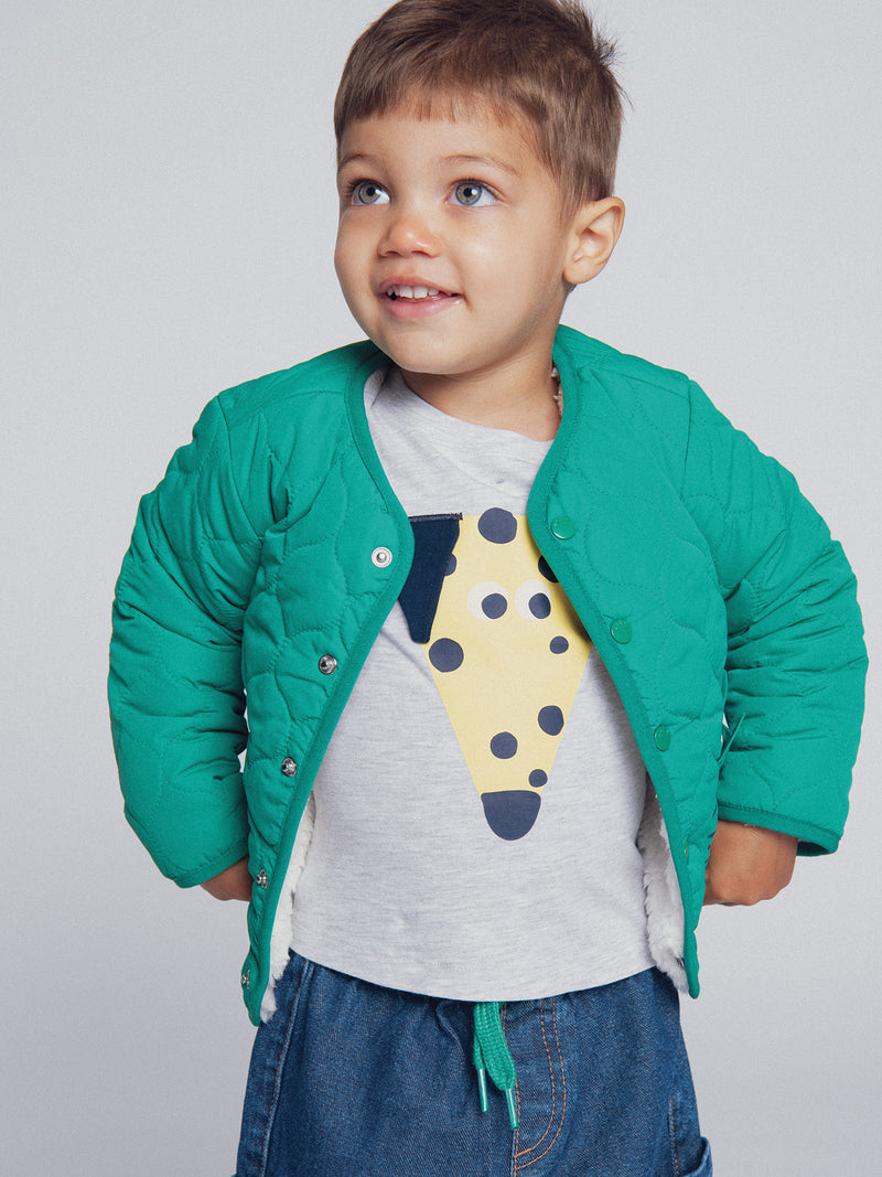Gilet reversible verde prato e ecru "ARTY SCHOOL" per bambino