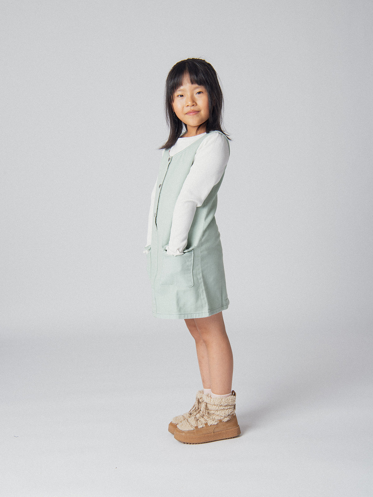 Robe verte sauge à poches pour fille