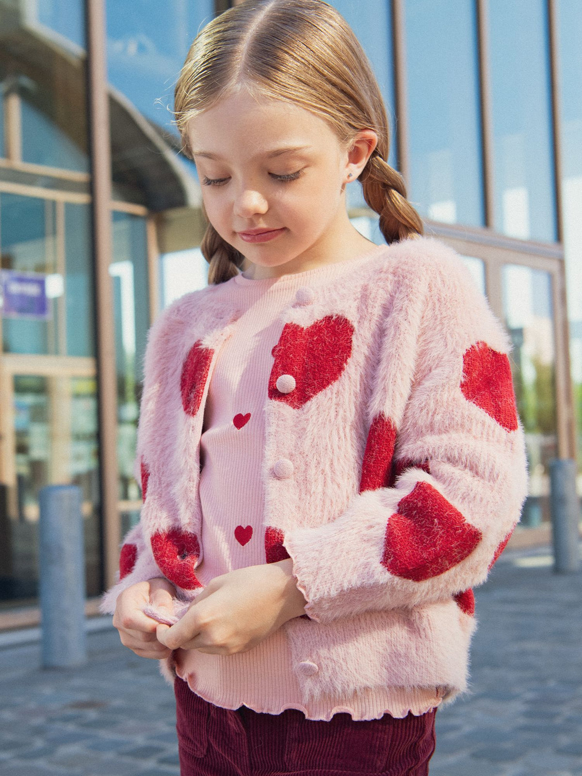 Cardigan rosa con motivo a cuori per ragazze