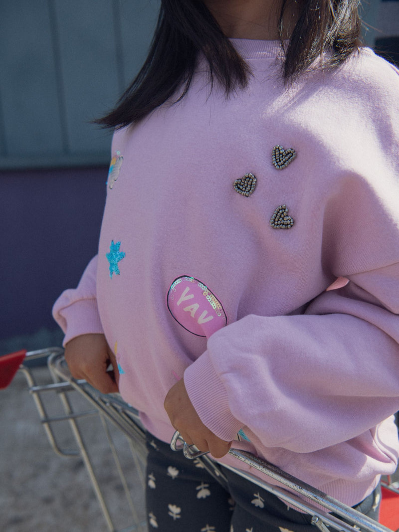 Sweat rose à animations fantasies