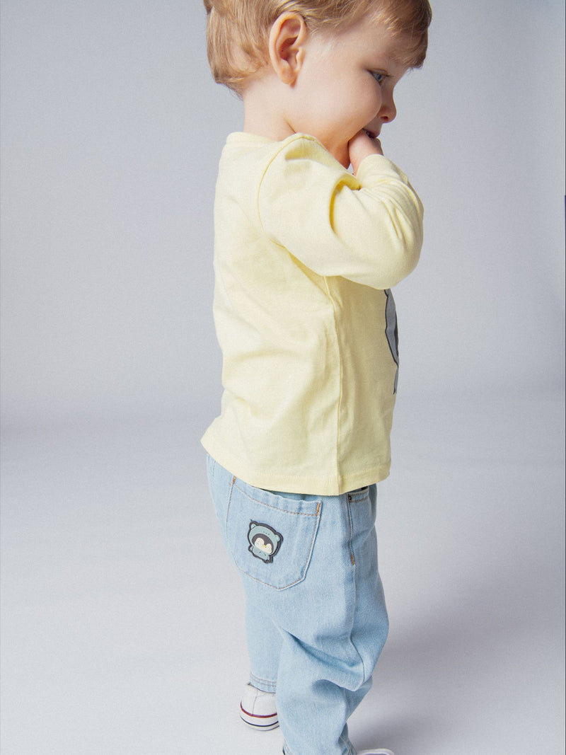 Jeans foderati in micro-pile con distintivo di pinguino per bambino