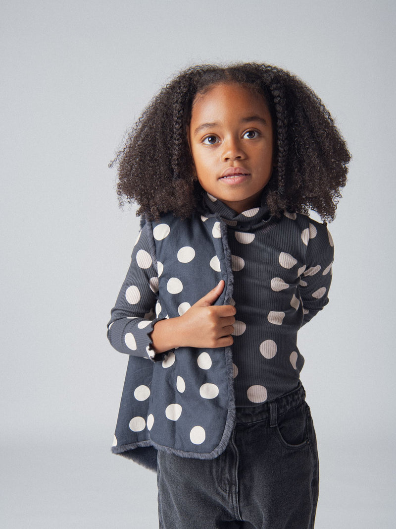 Cardigan gris foncé en  fourrure synthétique sans manches et réversible pour fille