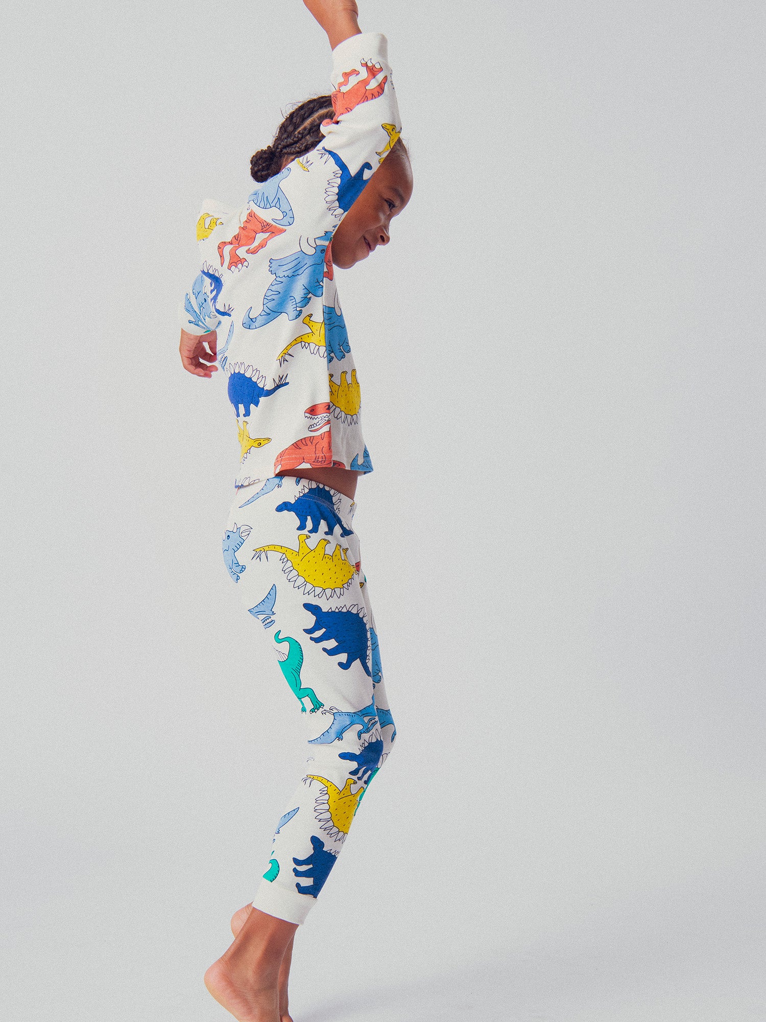 Pigiama ecru stampato con dinosauro per bambino