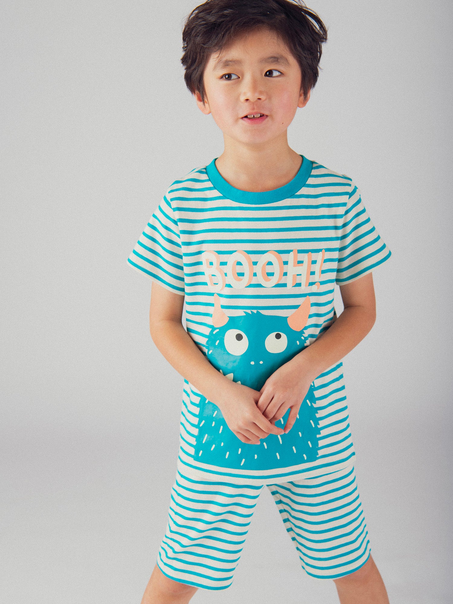 Pigiama corto fosforescente a righe con motivo "Mostro Divertente" per bambino