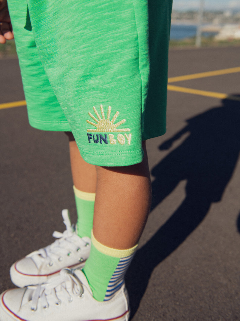 Set verde con animazione del sole per ragazzi