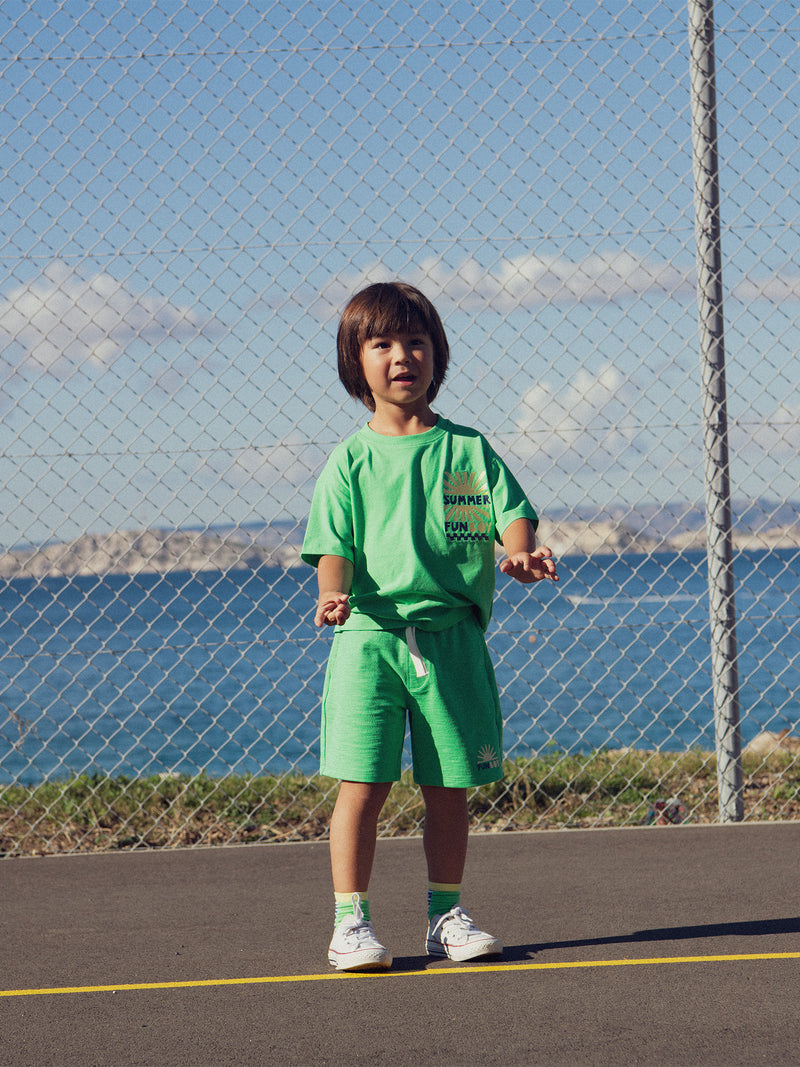 Set verde con animazione del sole per ragazzi