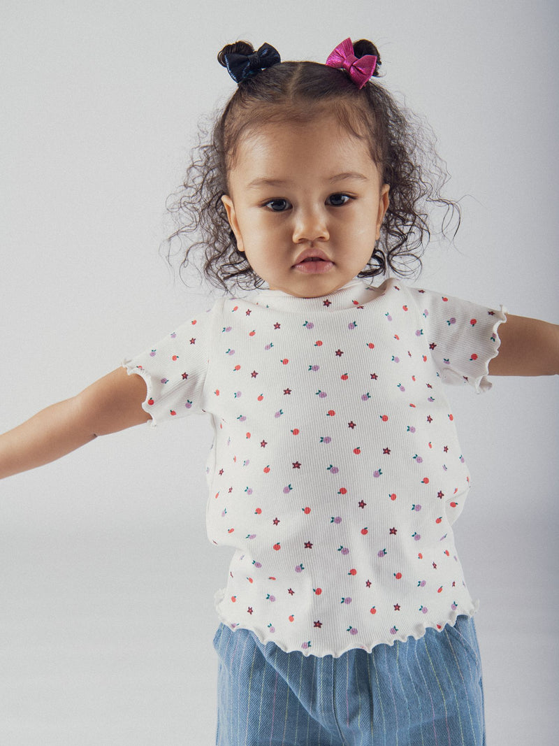 T-shirt bianca a maniche corte con stampa floreale integrale per bambine