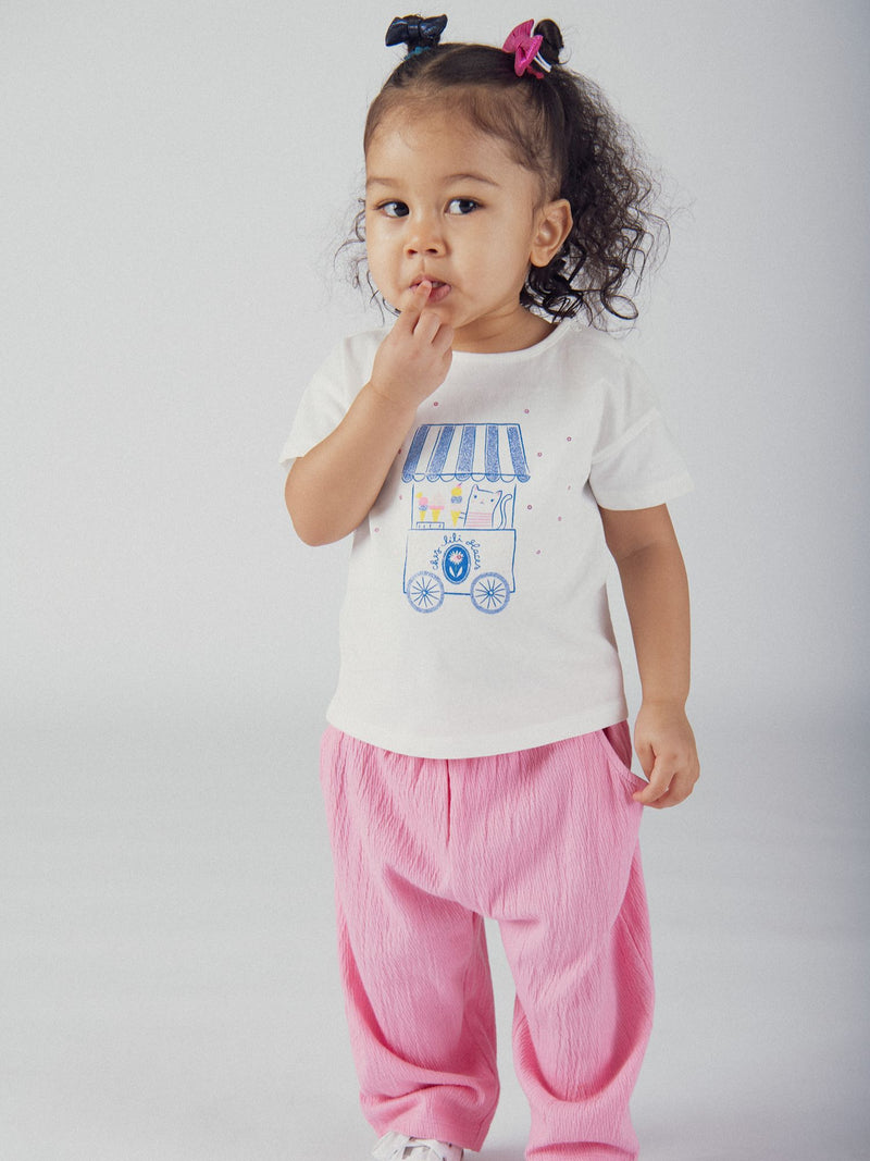 Pantaloni rosa caramella con fiocco per bambine