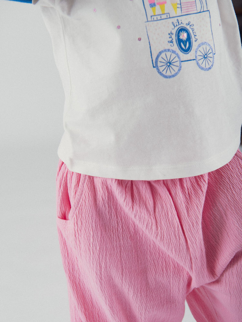 Pantaloni rosa caramella con fiocco per bambine